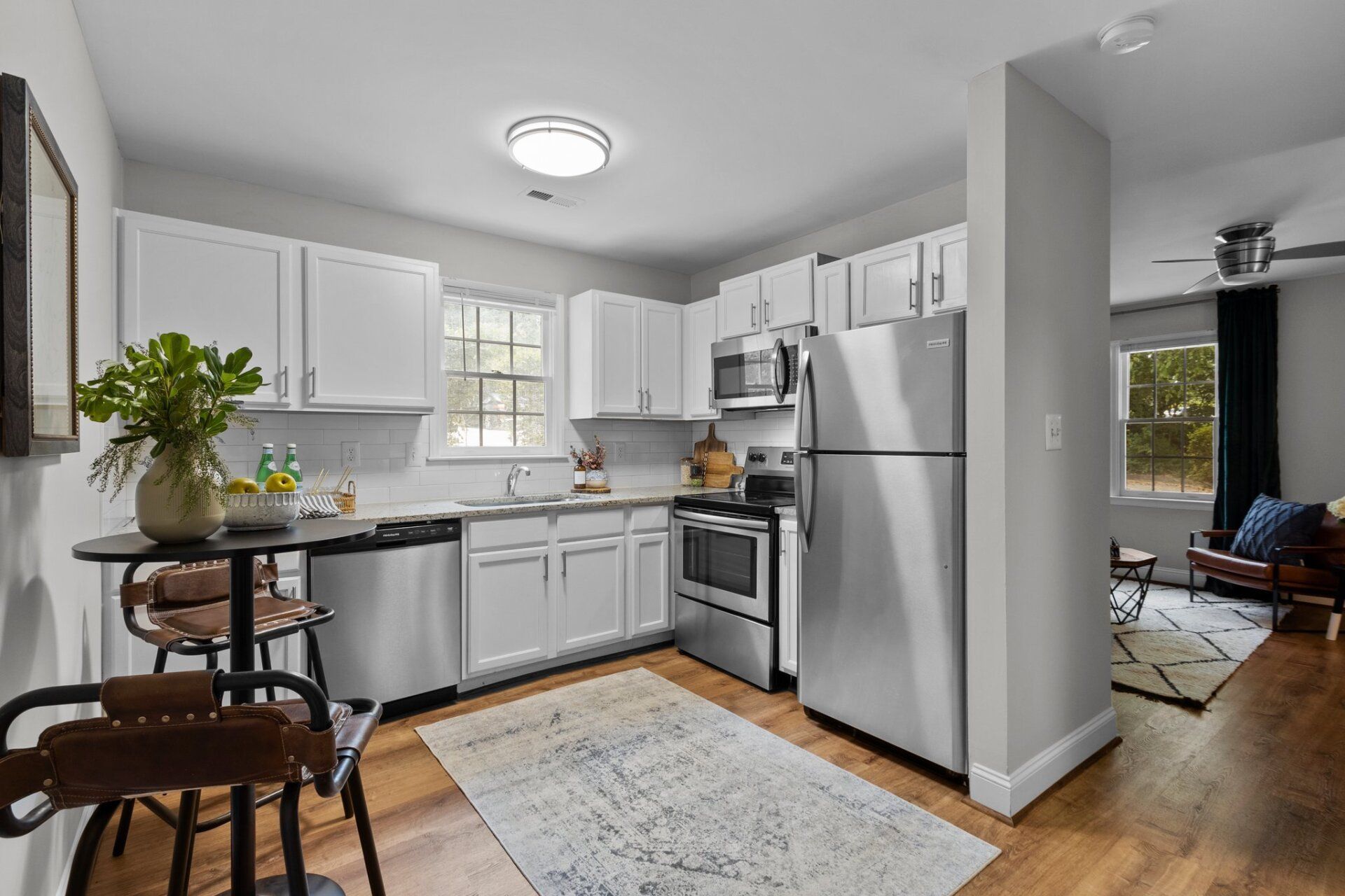 kitchen area with fridge view 2