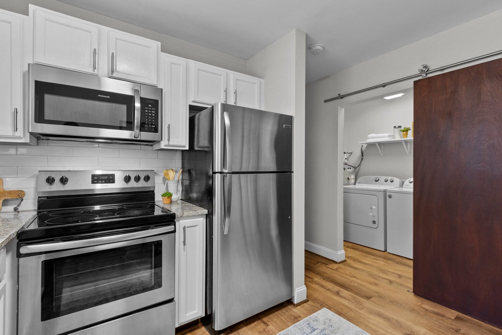 kitchen area with fridge