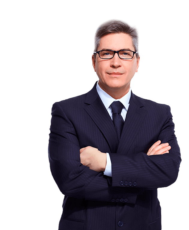 A man in a suit and tie with his arms crossed