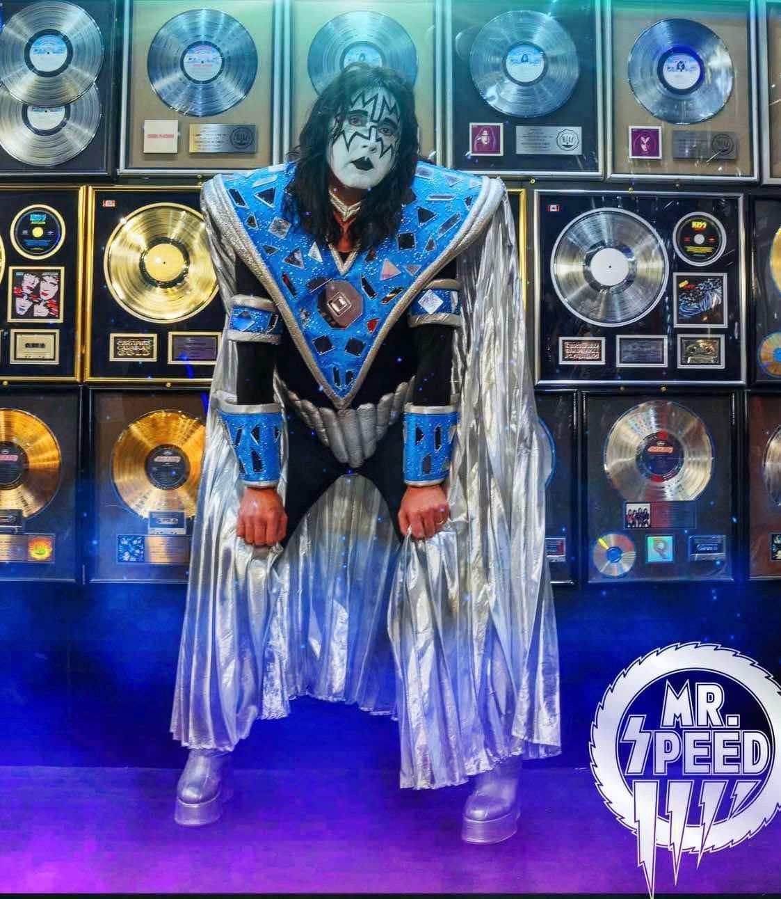 Mark Hermansen at KISS World Gold & Platinum album wall