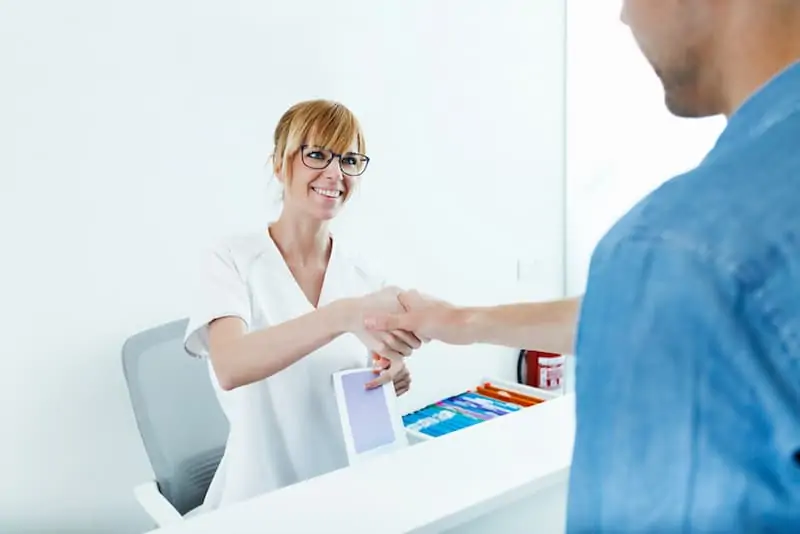 Beautician Shaking Hands with Client — Dearborn, MI — Masri Clinic Beautician Shaking Hands with Client — Dearborn, MI — Masri Clinic