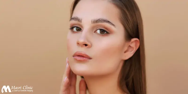 Woman Uses Sculptra Liquid Facelift — Dearborn, MI — Masri Clinic Woman Uses Sculptra Liquid Facelift — Dearborn, MI — Masri Clinic