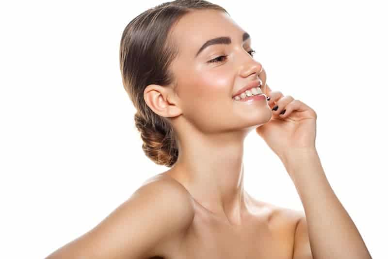Woman Smiling — Dearborn, MI — Masri Clinic Woman Smiling — Dearborn, MI — Masri Clinic
