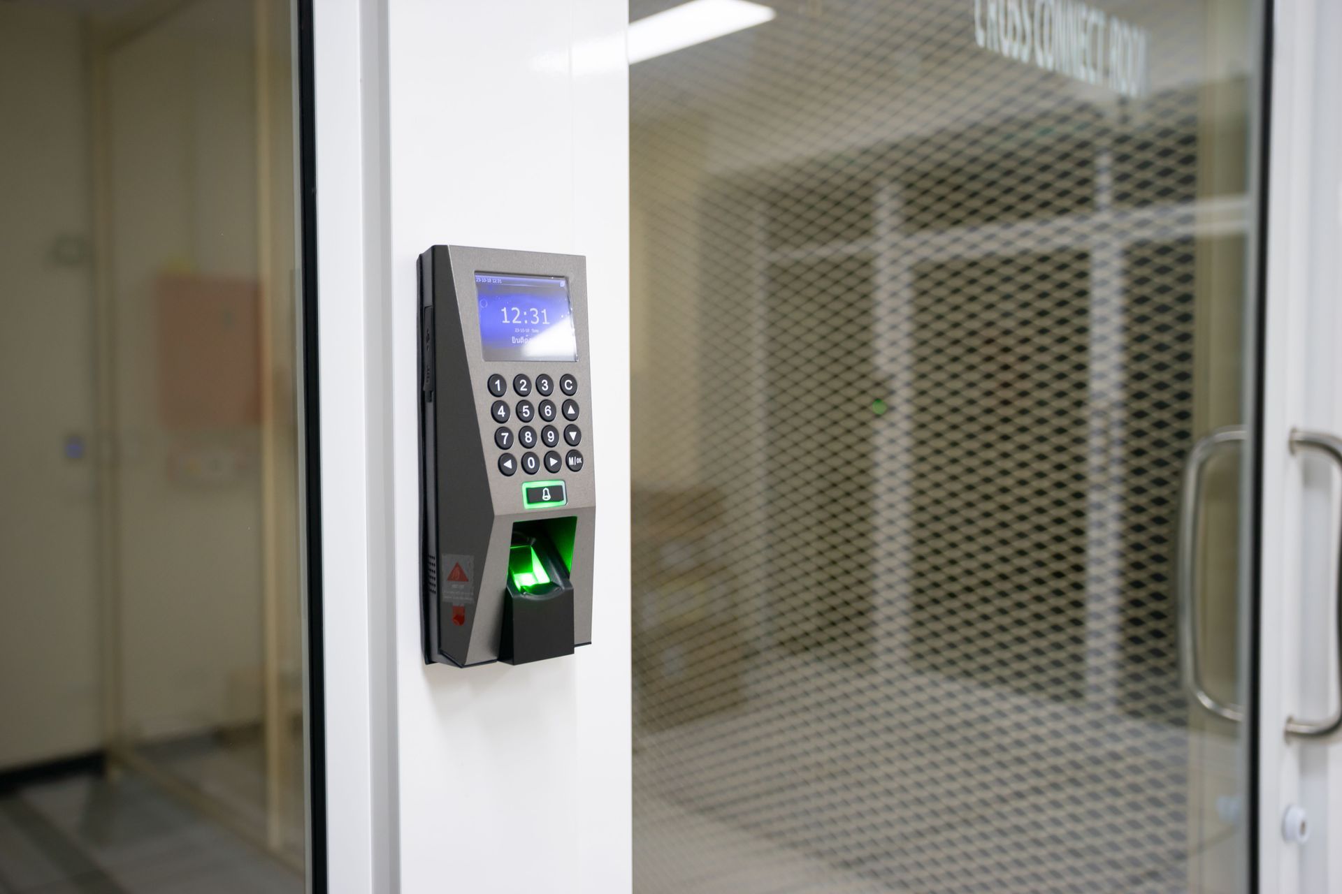 Handing over a key between two people in a blurred indoor setting