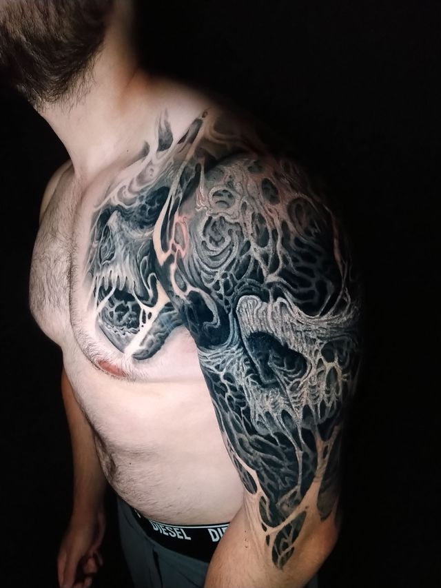 Dark freehand tattoo — bio-organic design
drawn directly onto skin by Crawlspace Tattoo Artist based in London