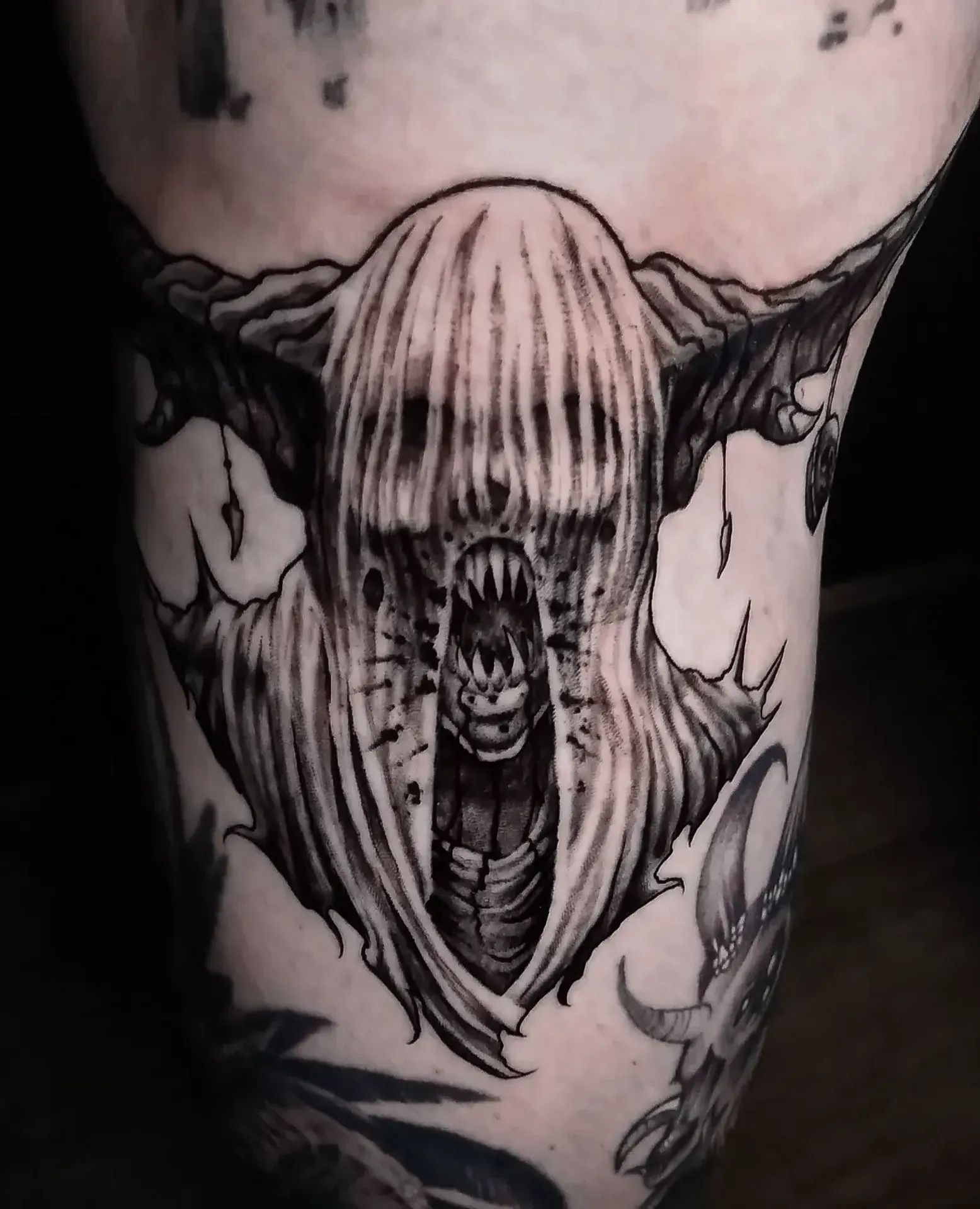 Dark freehand tattoo — bio-organic design
drawn directly onto skin by Crawlspace Tattoo Artist based in London