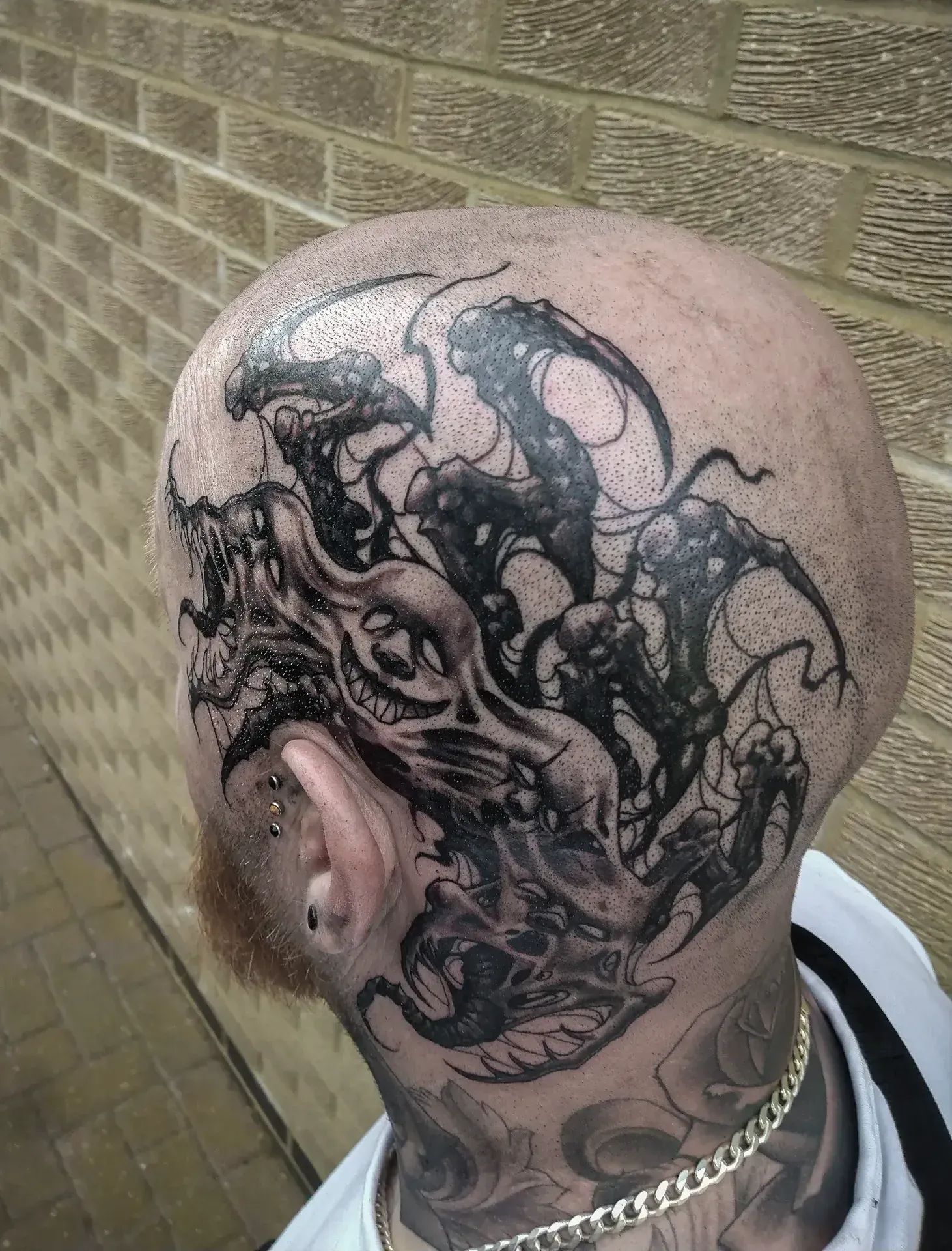 Dark freehand tattoo — bio-organic design
drawn directly onto skin by Crawlspace Tattoo Artist based in London