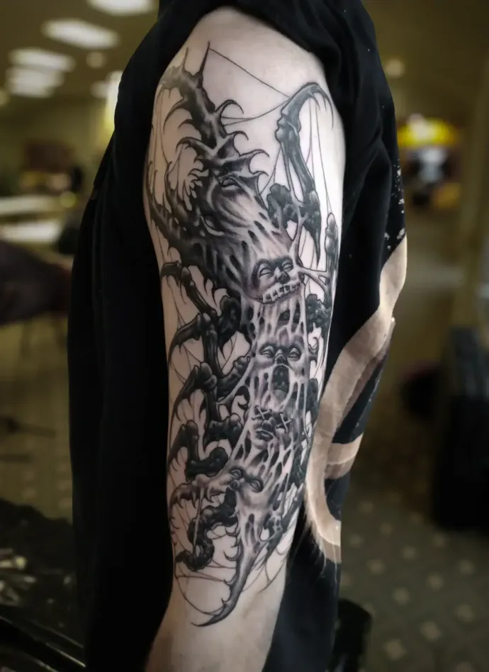 Dark freehand tattoo — bio-organic design
drawn directly onto skin by Crawlspace Tattoo Artist based in London