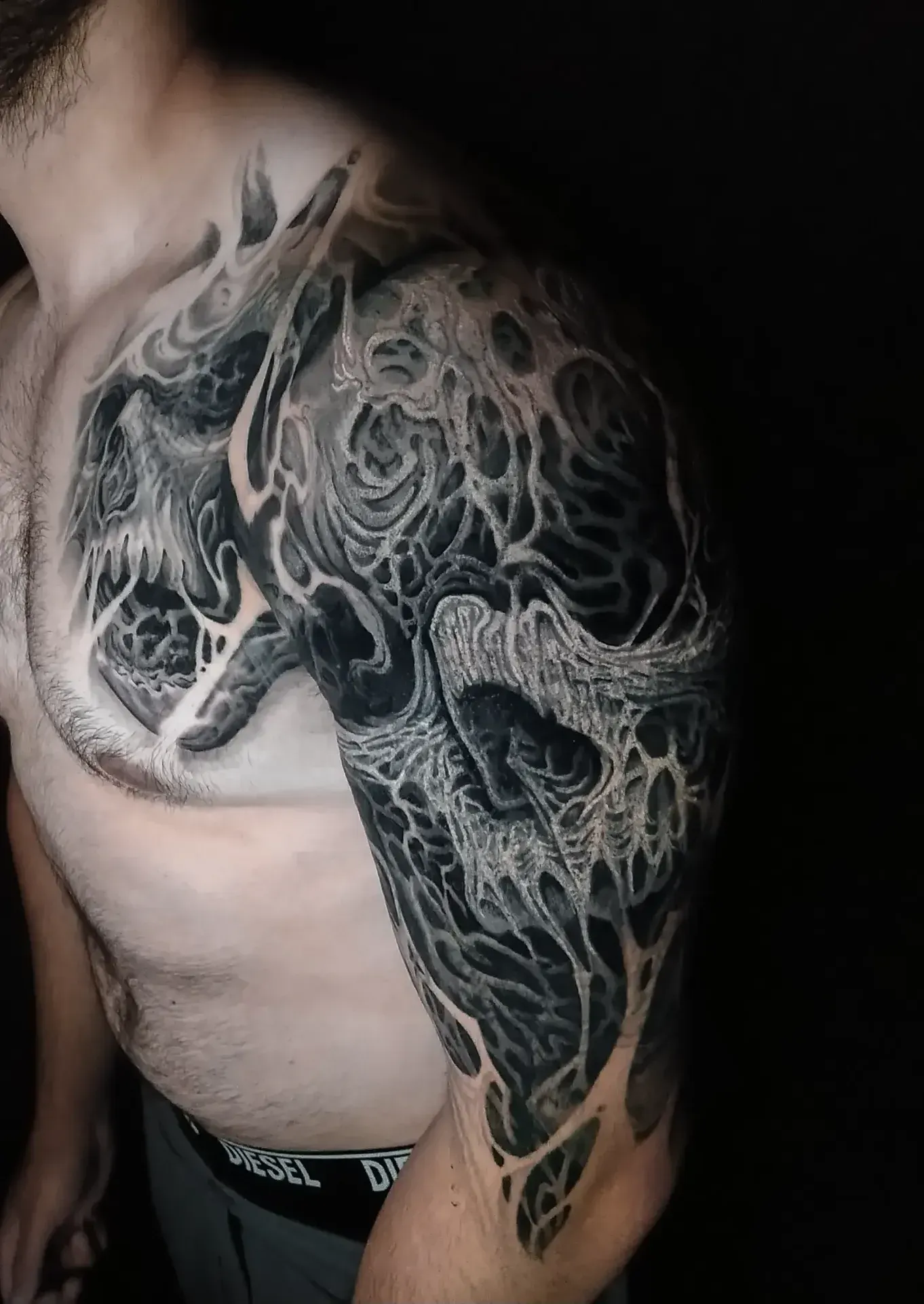 Dark freehand tattoo — bio-organic design
drawn directly onto skin by Crawlspace Tattoo Artist based in London