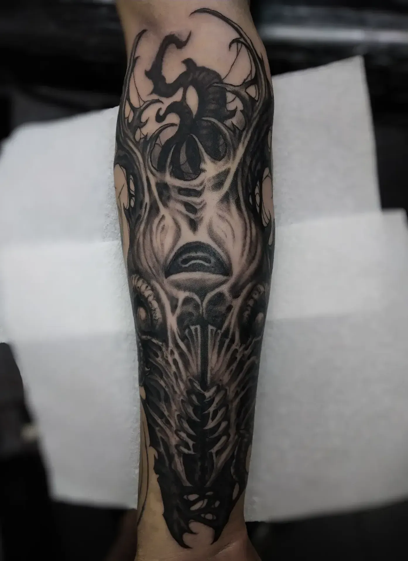 Dark freehand tattoo — bio-organic design
drawn directly onto skin by Crawlspace Tattoo Artist based in London