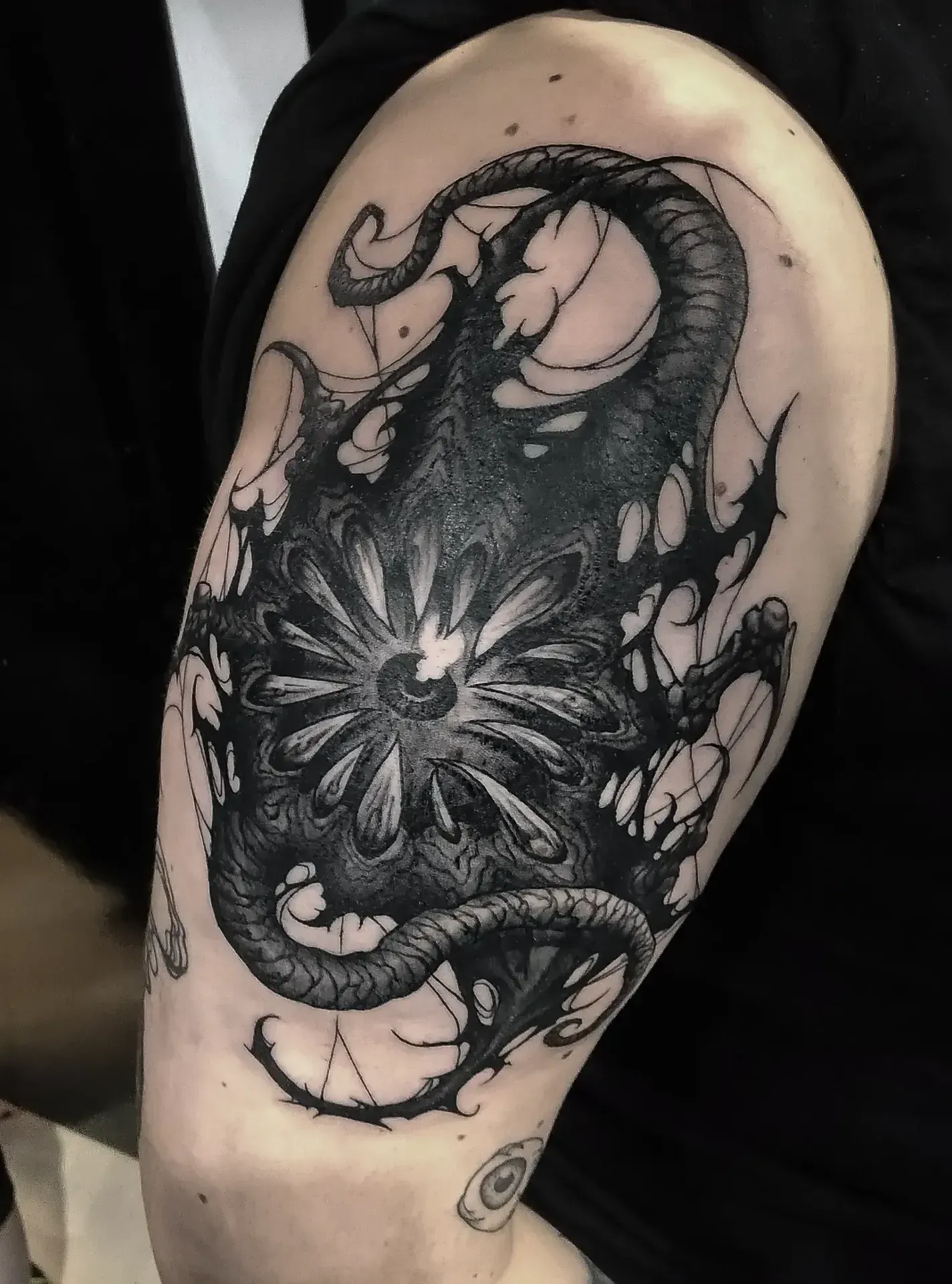 Dark freehand tattoo — bio-organic design
drawn directly onto skin by Crawlspace Tattoo Artist based in London