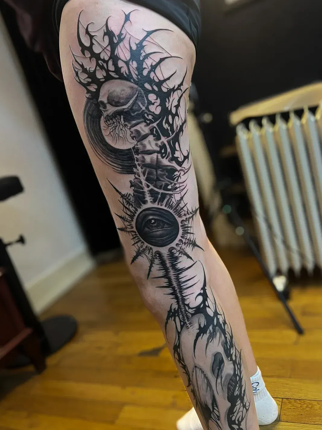 Dark freehand tattoo — bio-organic design
drawn directly onto skin by Crawlspace Tattoo Artist based in London