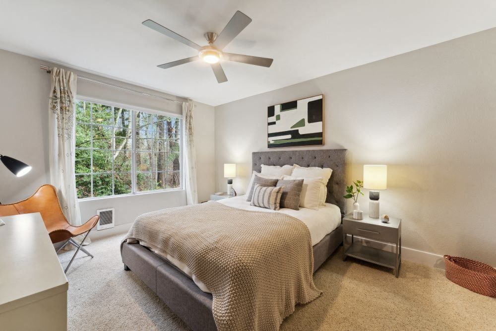 Bedroom with bed and window.