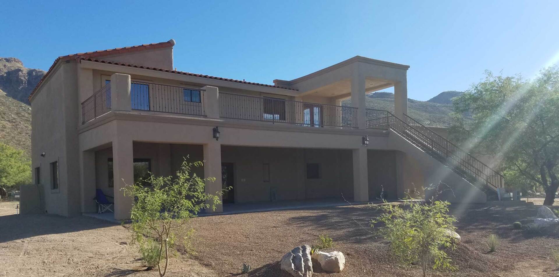 Two-story new construction with a  balcony