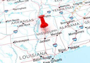 Red pushpin on a map of the south-central United States, near Tennessee and Mississippi