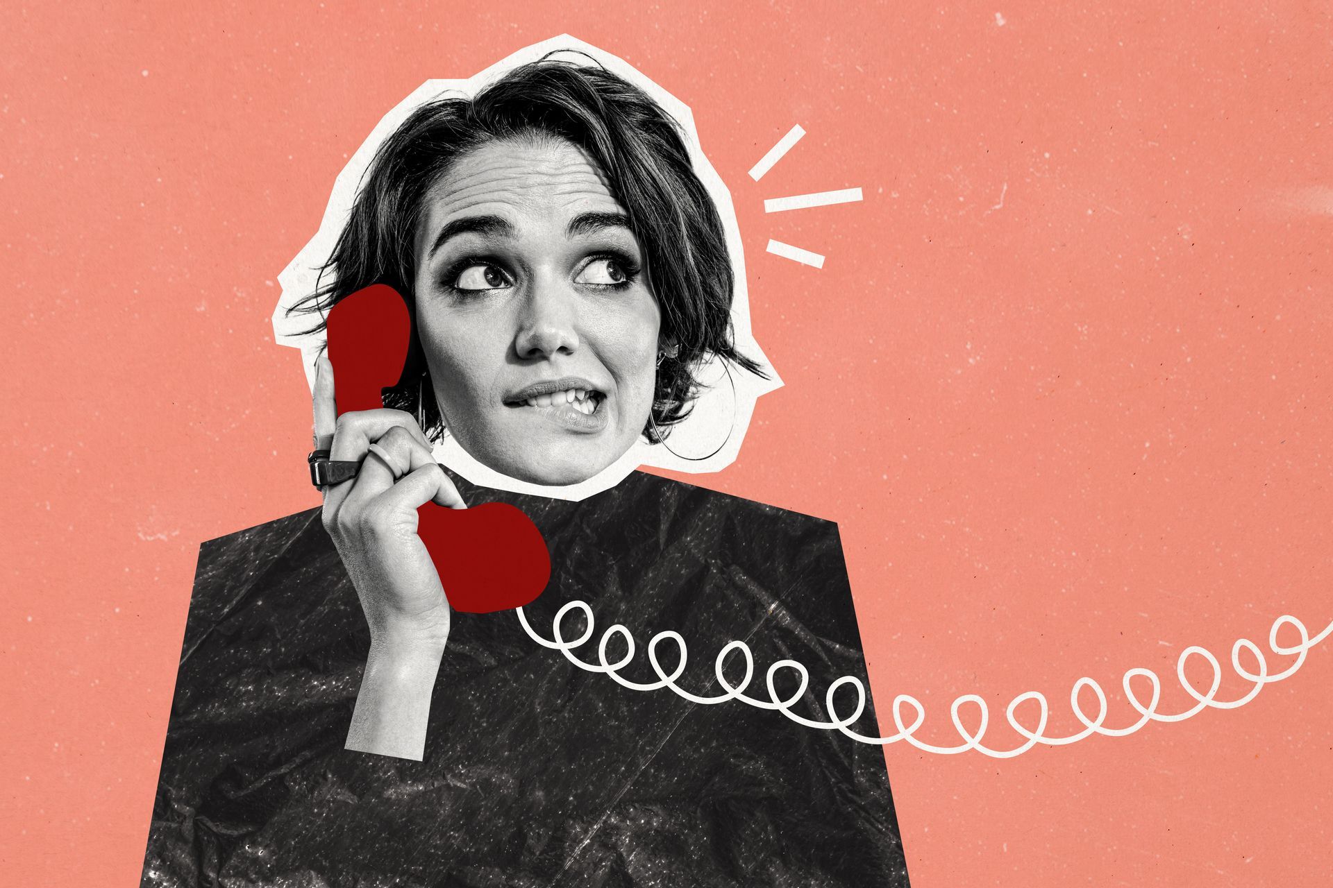 A woman is talking on a red telephone.