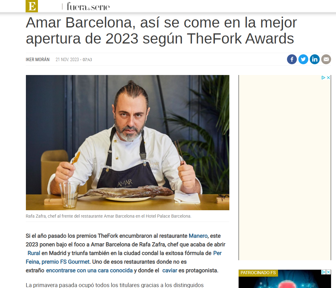 Un hombre con delantal está sentado en una mesa con un plato de comida.