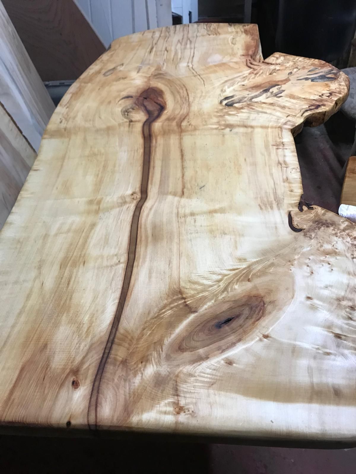 A piece of wood is sitting on top of a table.