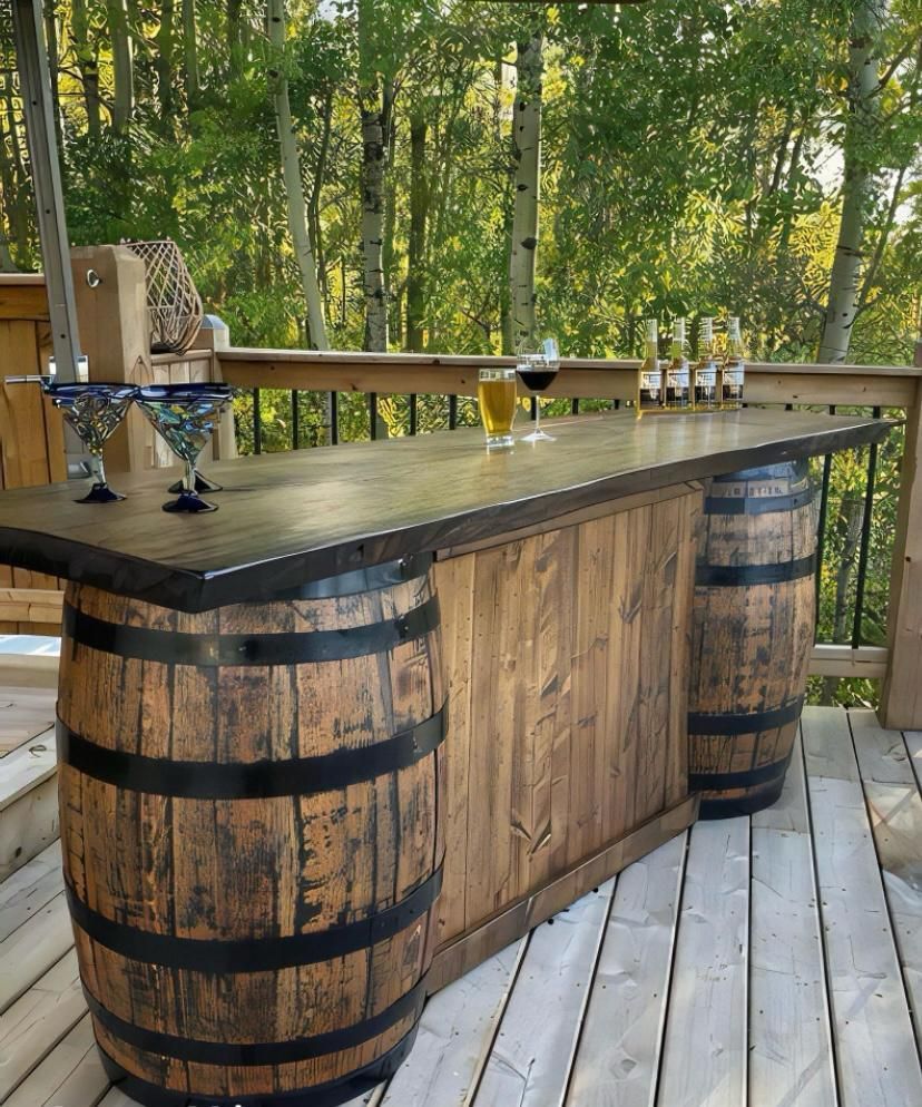 A wooden table with two barrels on it