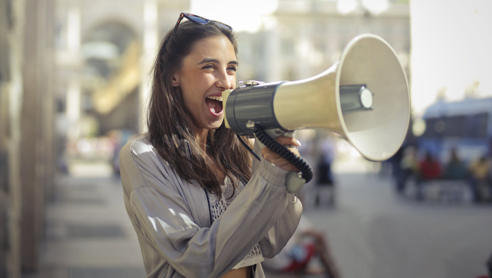 Lady yelling in megaphone,