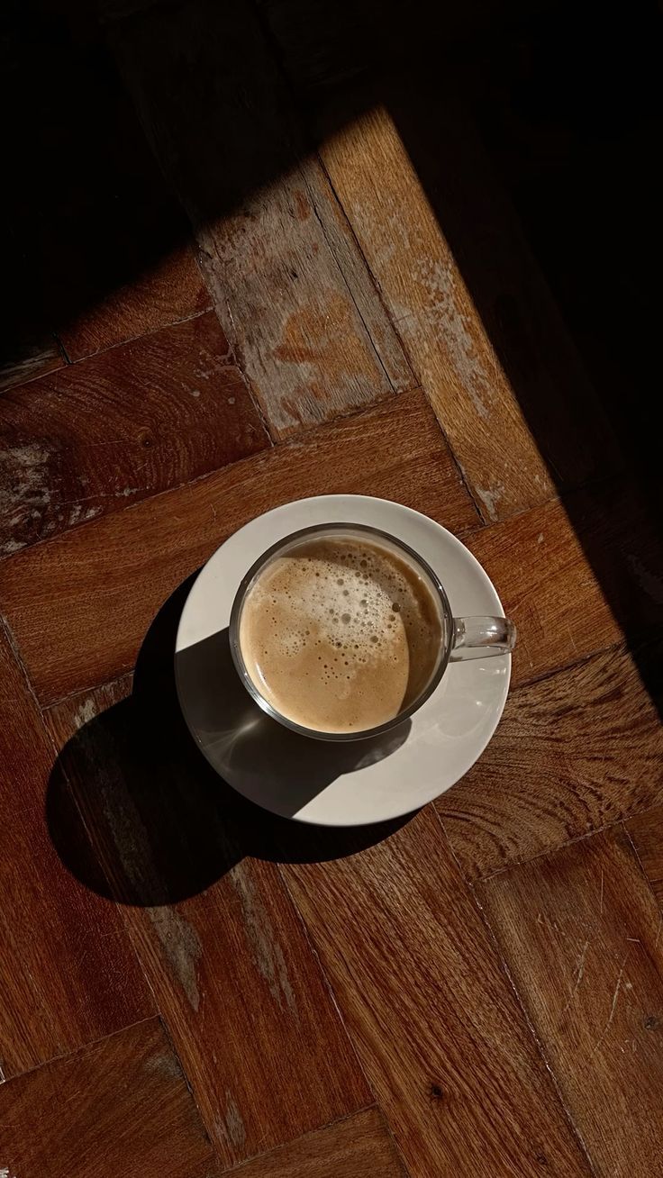 Coffee cup sitting on table.
