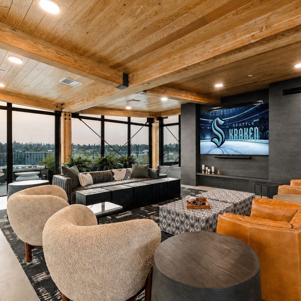 roof lounge with seating and large tv