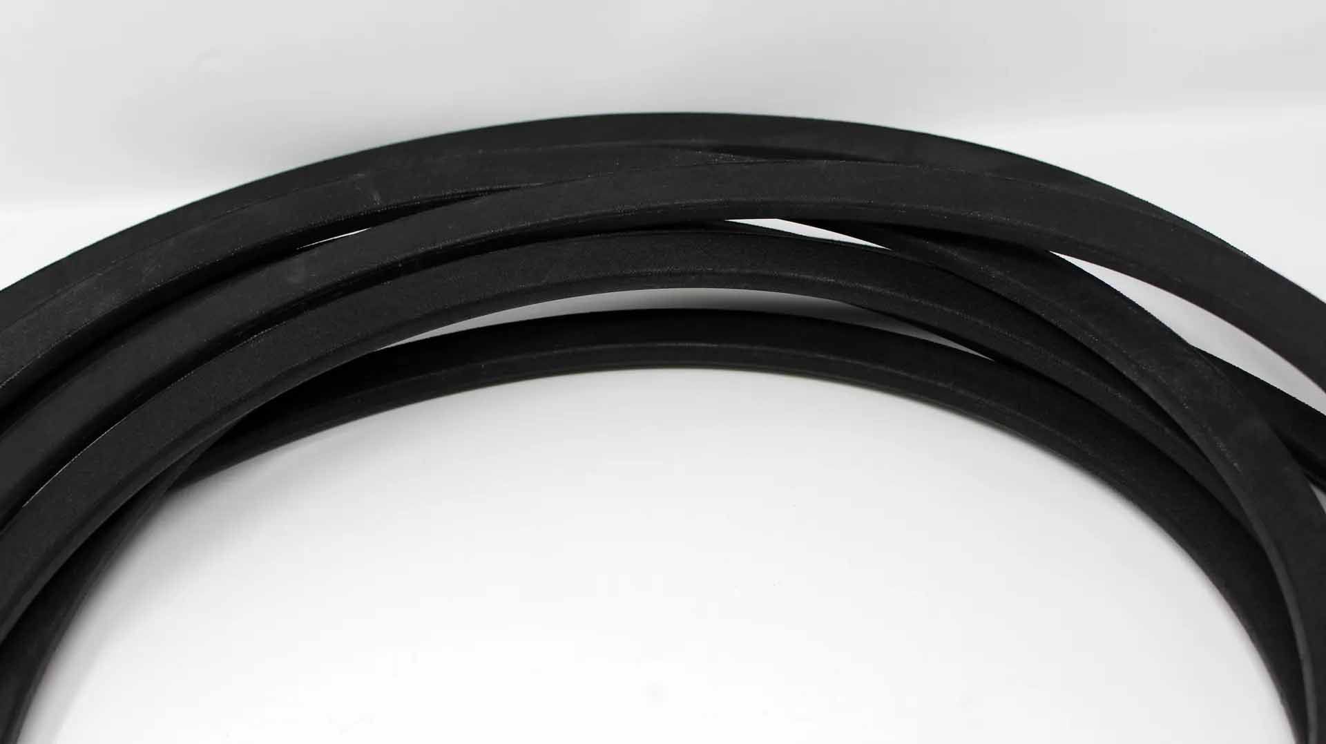 Black rubber belt, likely for a lawn mower, on a white background.