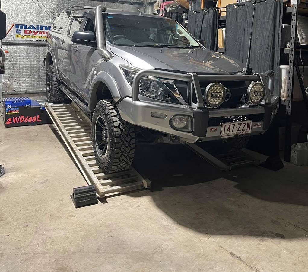 A Truck Is Parked On A Ramp In A Garage — Dieselflash Whitsundays in Mackay, QLD