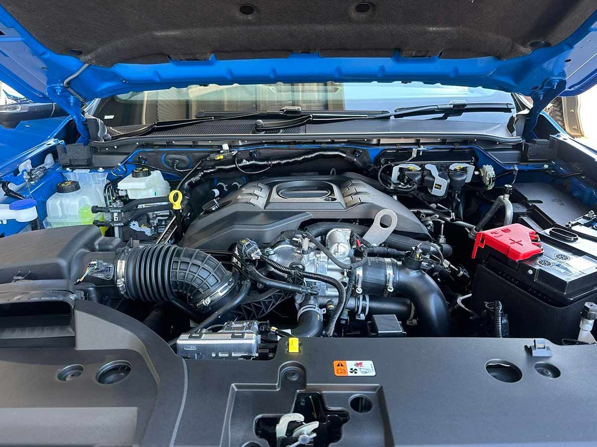 The Engine Of A Blue Car Is Shown With The Hood Open — Dieselflash Whitsundays in Proserpine, QLD