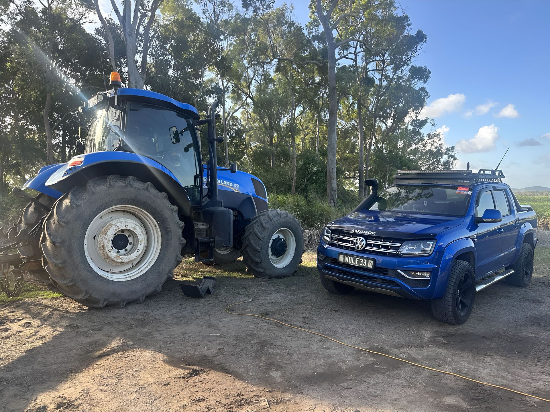 Blue Tractor and Blue SUV — Dieselflash Whitsundays in Proserpine, QLD