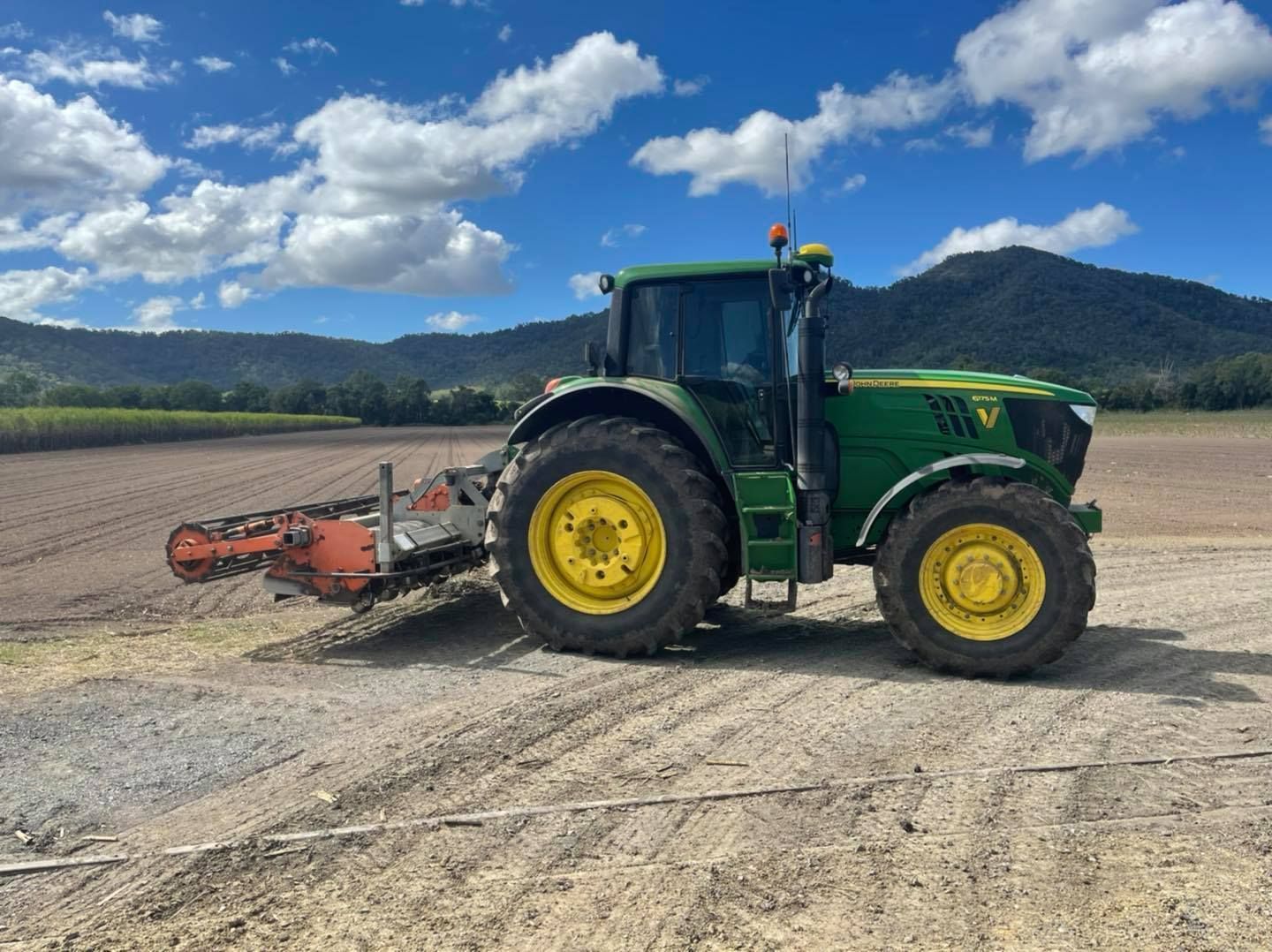 Green Tractor Towing a Tillage — Dieselflash Whitsundays in Bowen, QLD