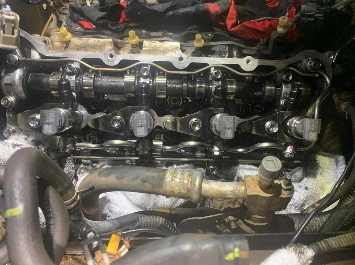 A Close Up Of A Car Engine With A Hose Coming Out Of It — Dieselflash Whitsundays in Proserpine, QLD