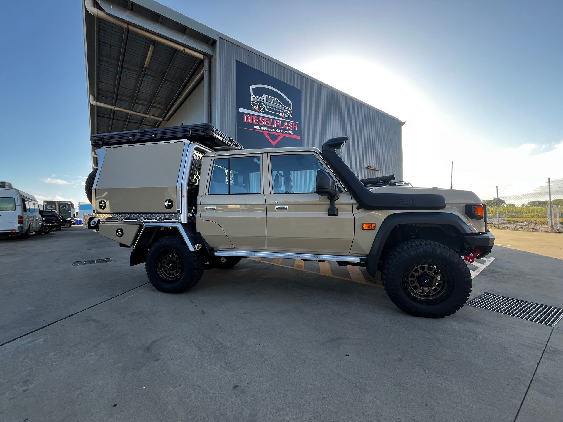 White Flatbed Truck Parked Outdoors — Dieselflash Whitsundays in Proserpine, QLD