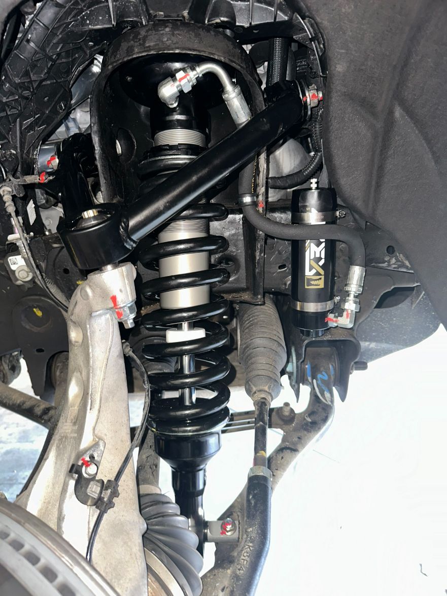 A Close Up Of A Shock Absorber On A Vehicle — Dieselflash Whitsundays in Proserpine, QLD