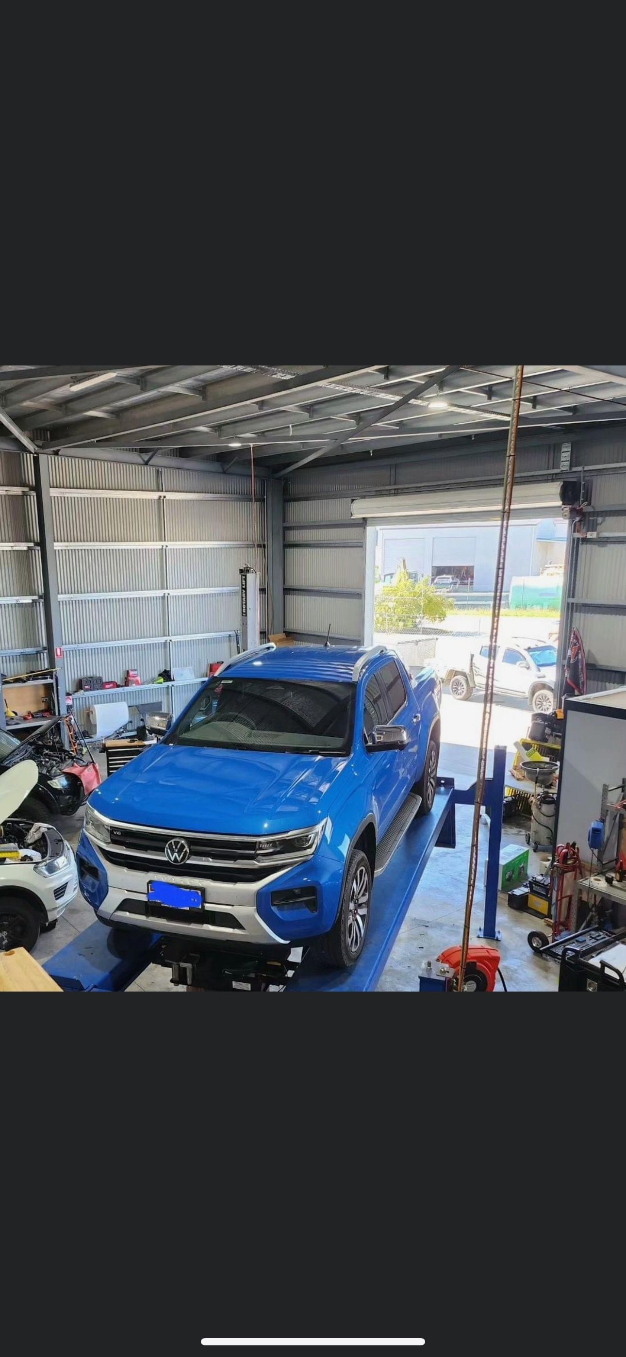 Blue Amarok Parked In Shop — Dieselflash Whitsundays in Proserpine, QLD