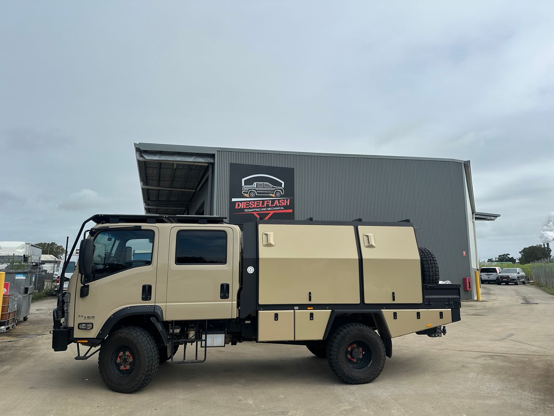 White Flatbed Truck Parked Outdoors — Dieselflash Whitsundays in Mackay, QLD