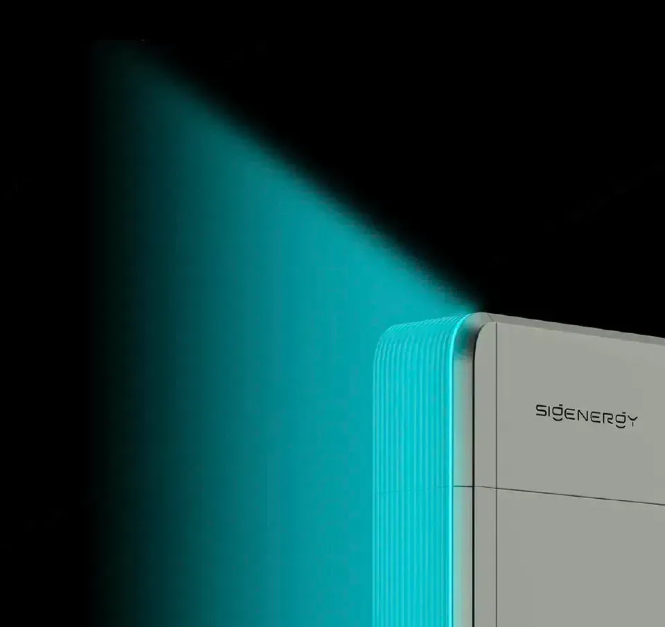Turquoise light beam illuminating a white Synergy device against a black background