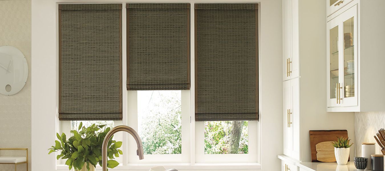 a kitchen with a sink and a window with blinds on it All Window Decor (817) 448-3393.