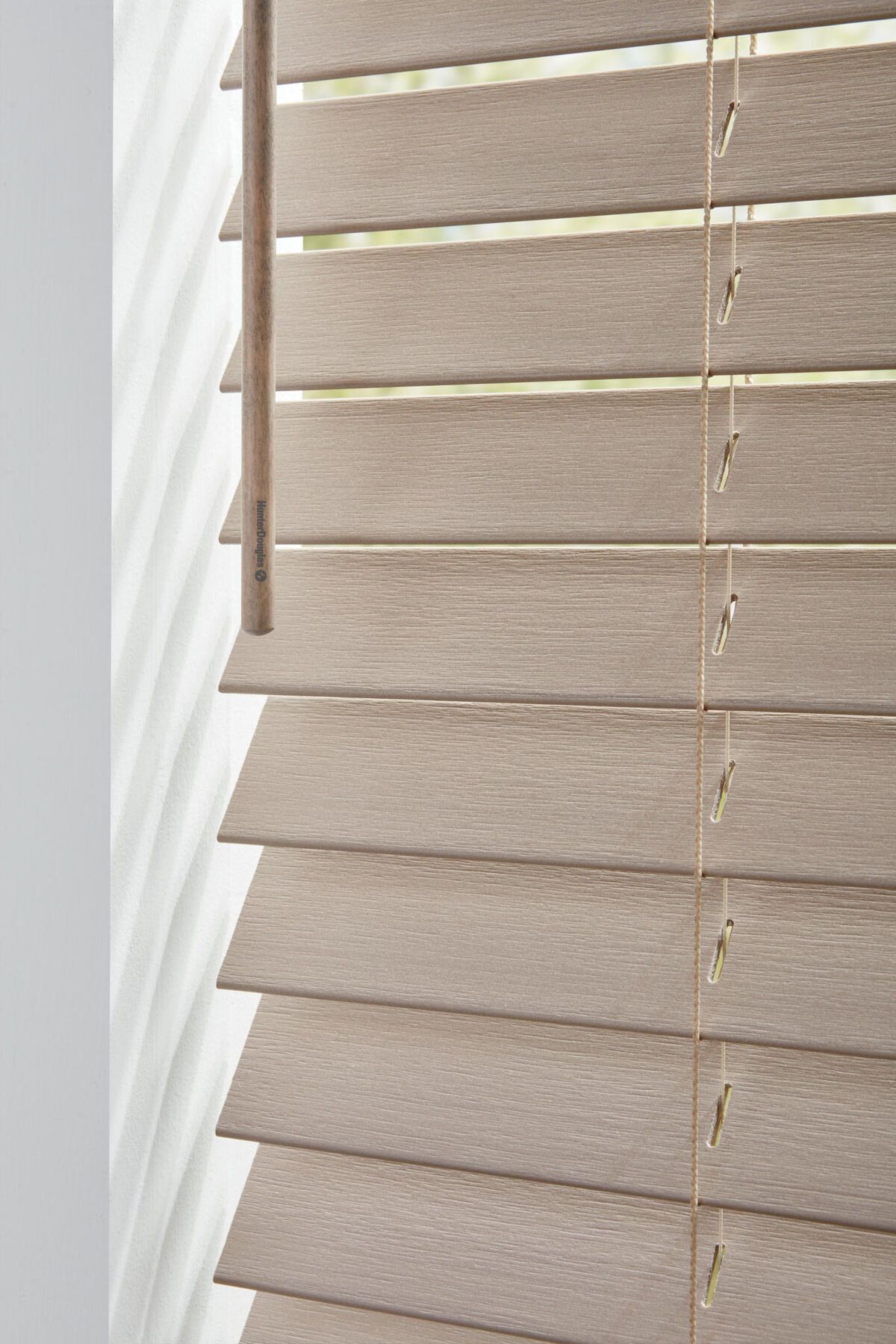 a close up of a wooden blind on a window All Window Decor (817) 448-3393.