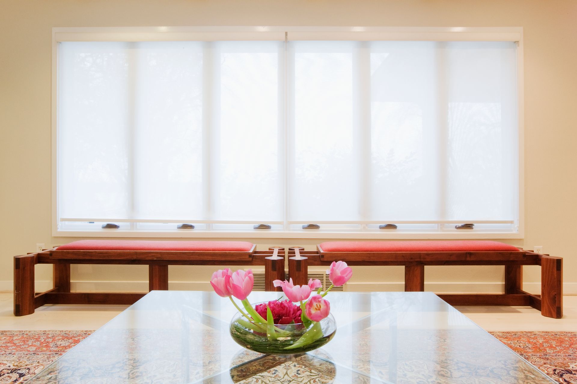 a bowl of flowers sits on a table in front of a window All Window Decor (817) 448-3393.