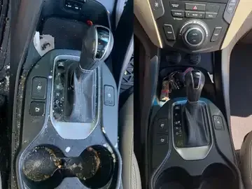 Two car center consoles with automatic gear shifters and cup holders, one with worn surfaces