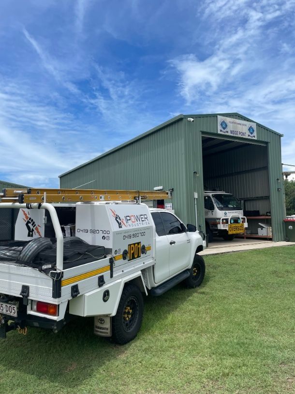 A Warehouse With A Truck Parked Outside — IPOWER Industries In Strathdickie, QLD