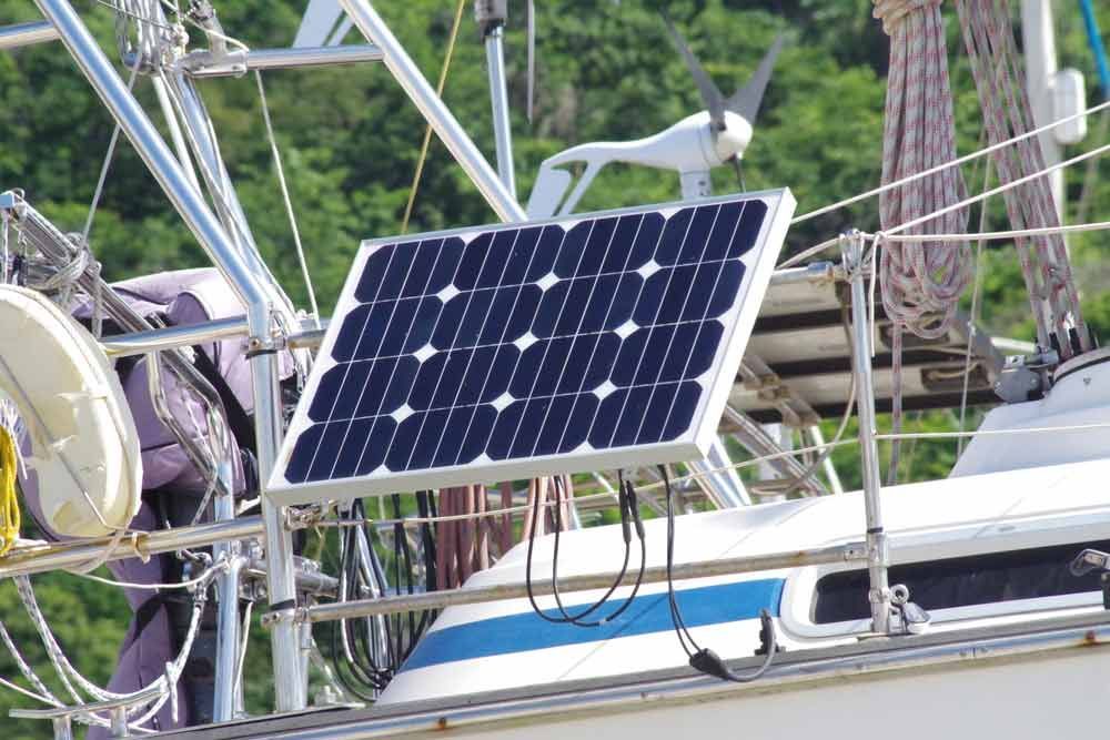 A Solar Panel Is Mounted On The Side Of A Sailboat — IPOWER Industries In Airlie Beach, QLD