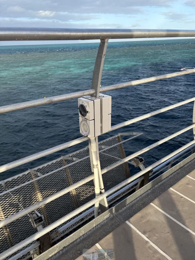 A Boat Is Being Charged At A Charging Station On A Dock — IPOWER Industries In Strathdickie, QLD