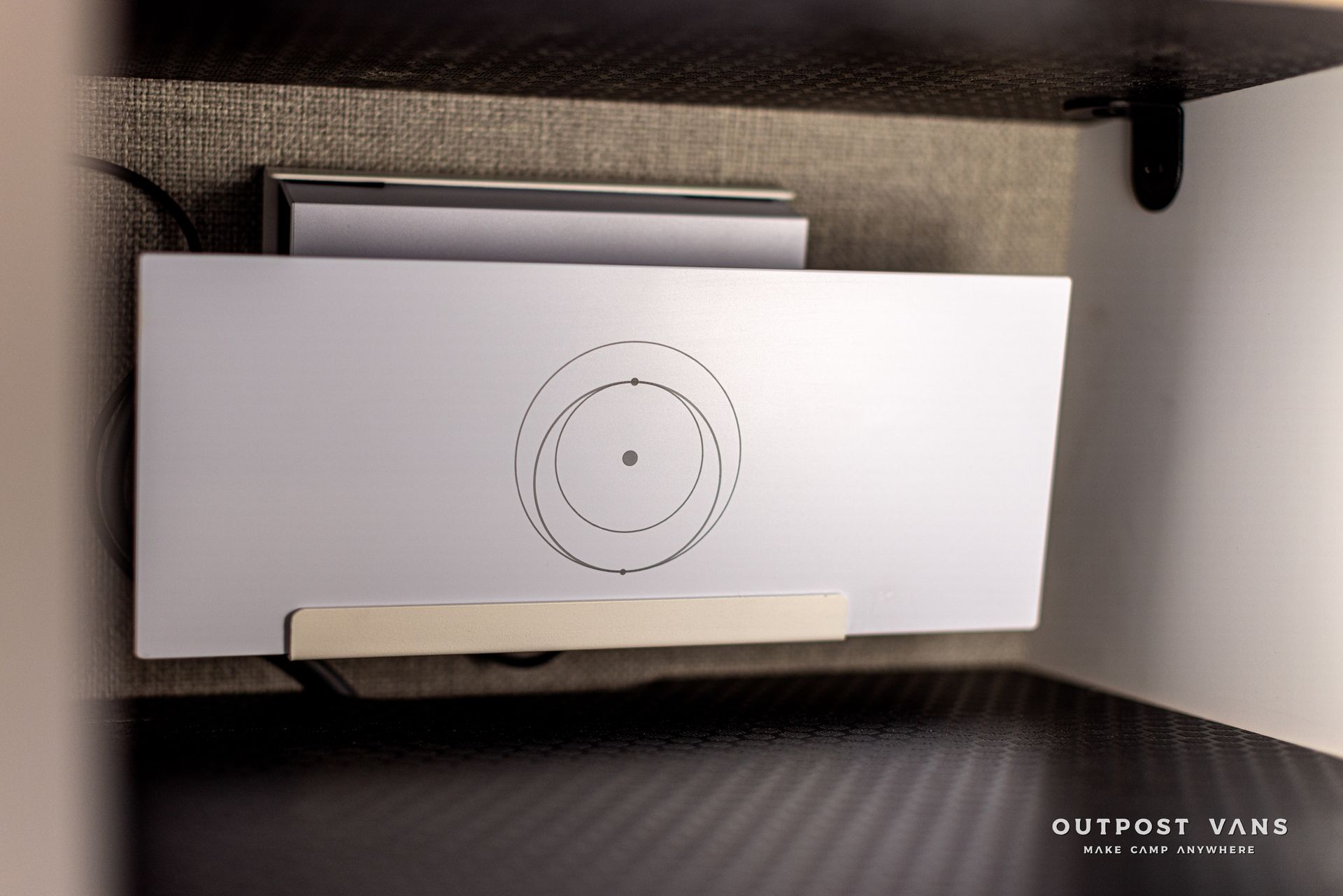 A white box with a circle on it that says outpost tank