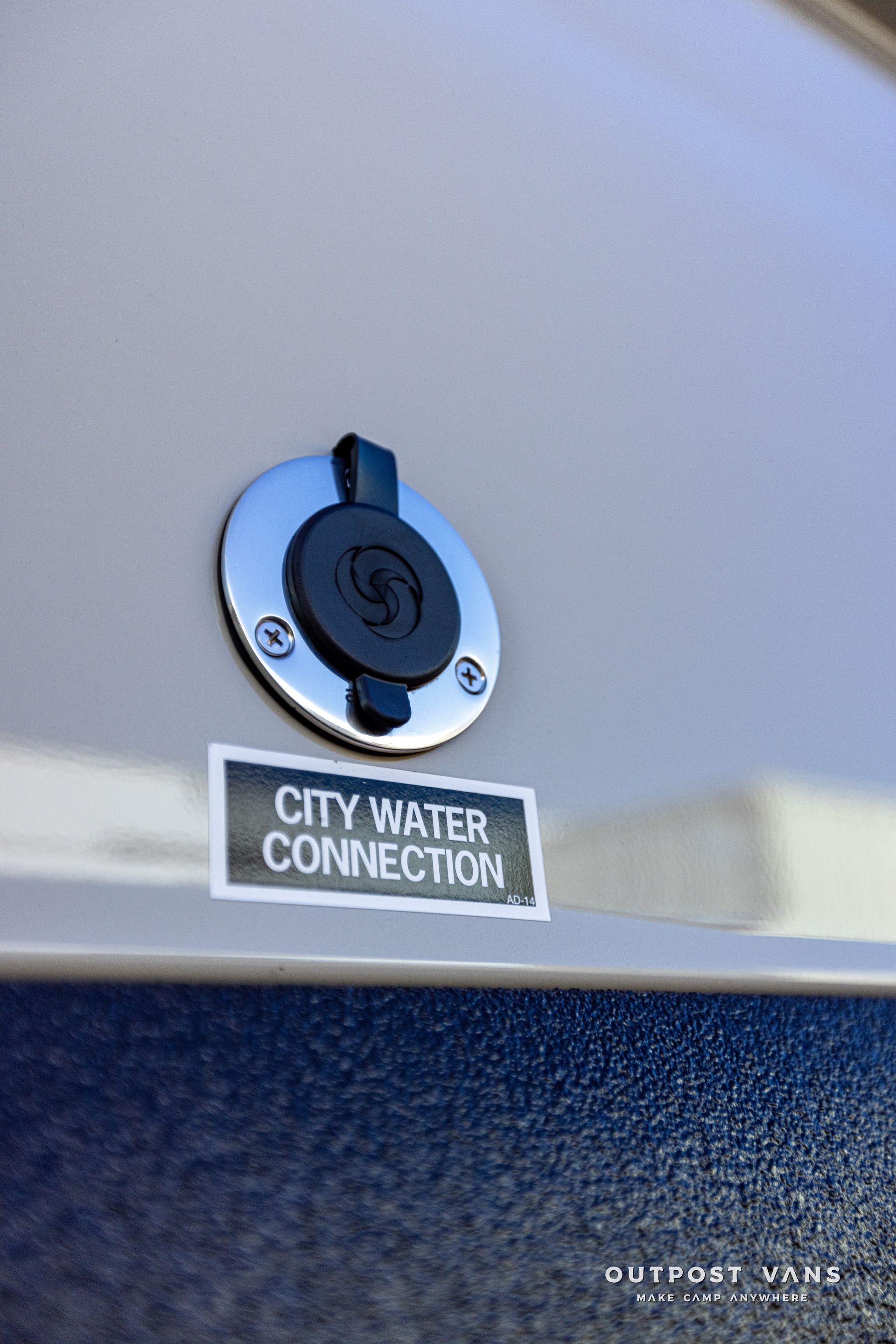A close up of a city water connection on a boat.