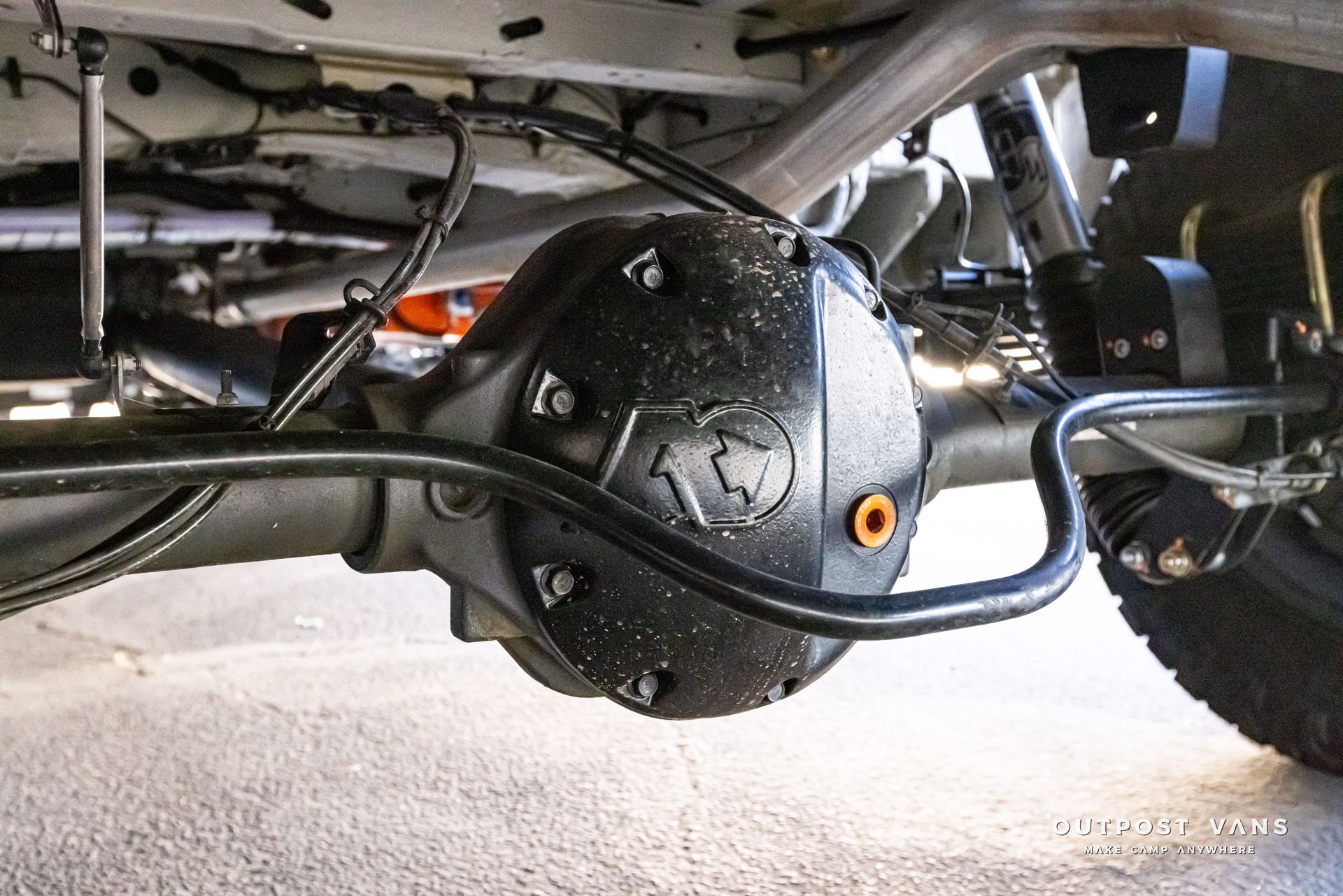 A close up of a rear differential on a truck.