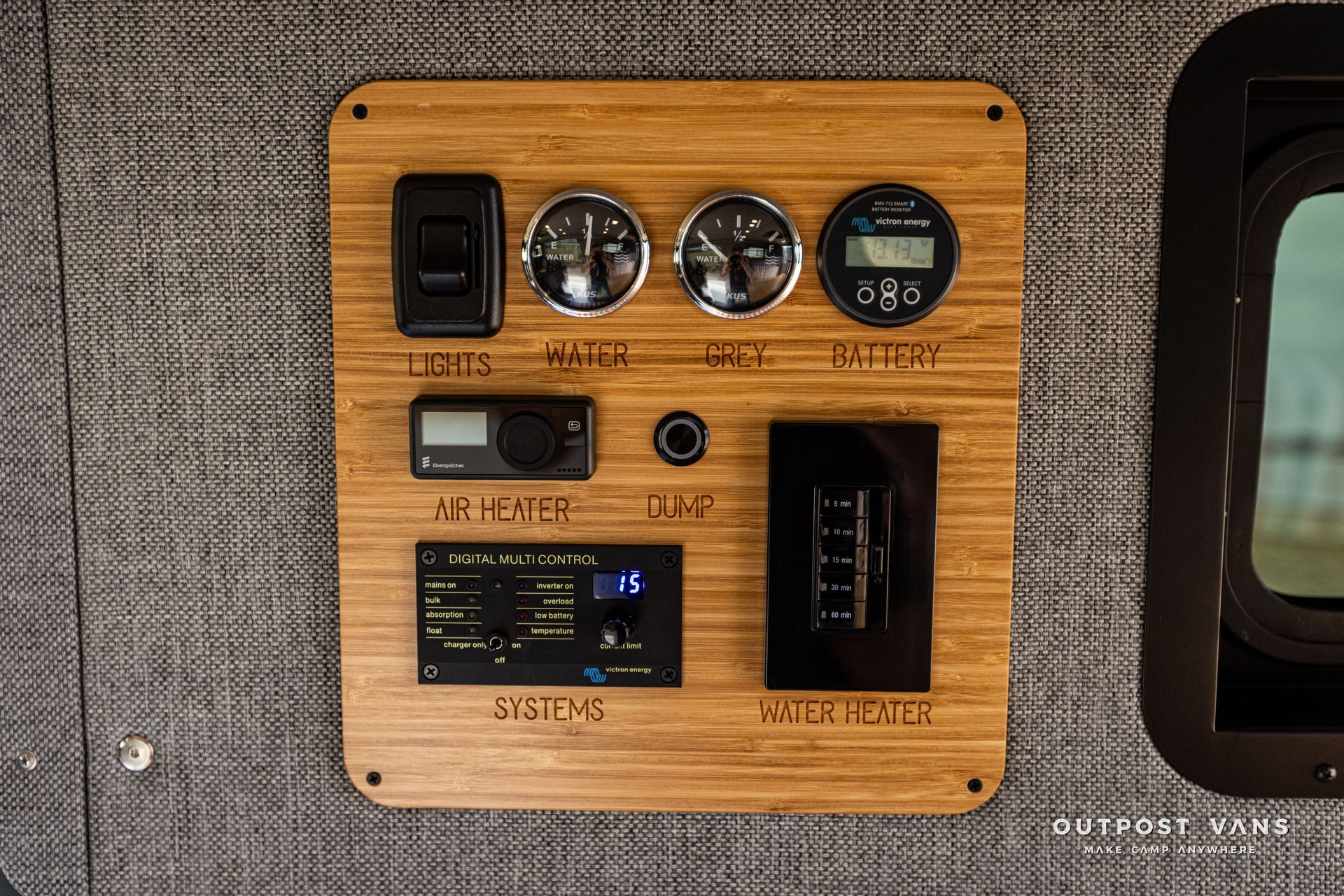A wooden panel with a lot of electronics on it.