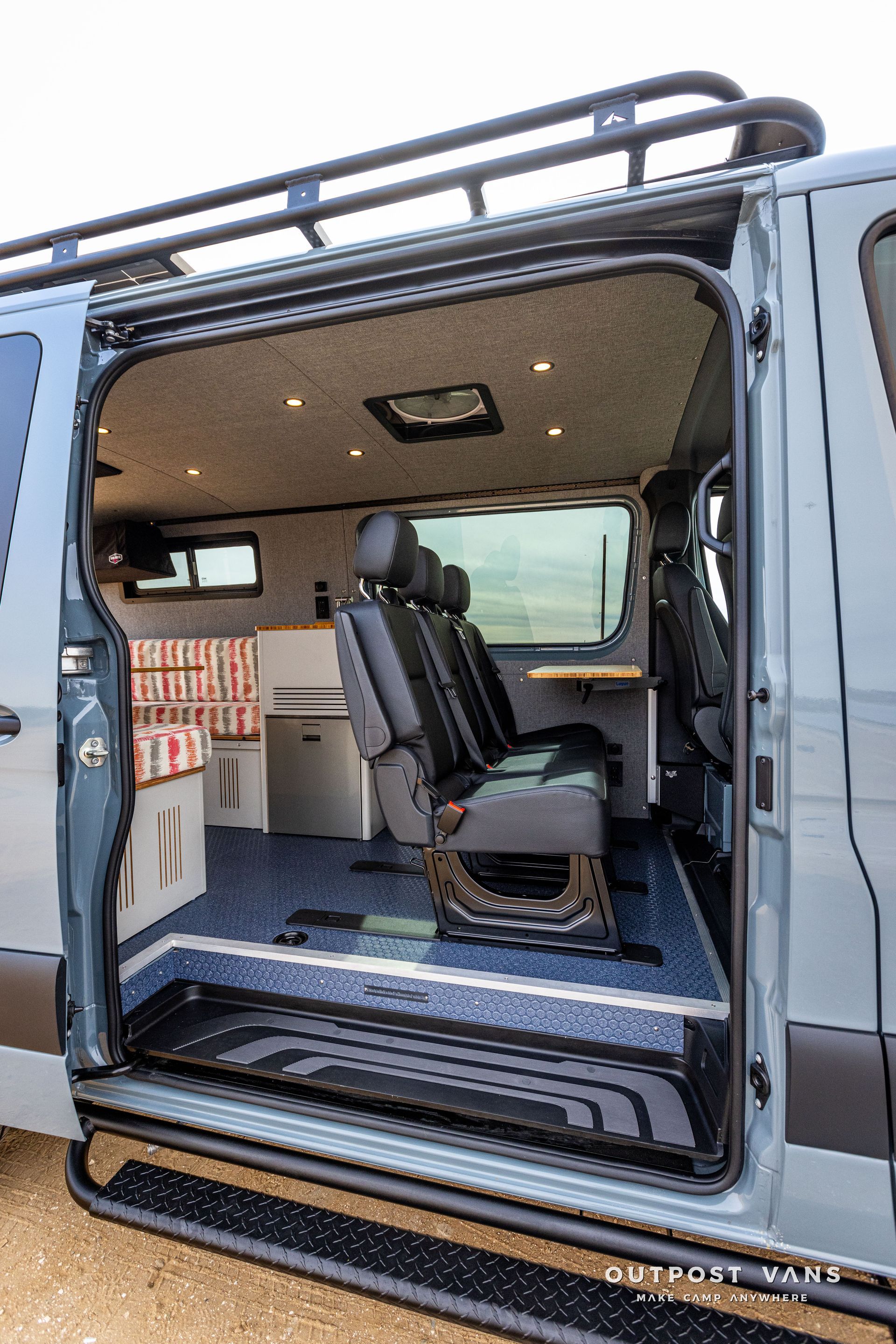 The inside of a van with the door open.