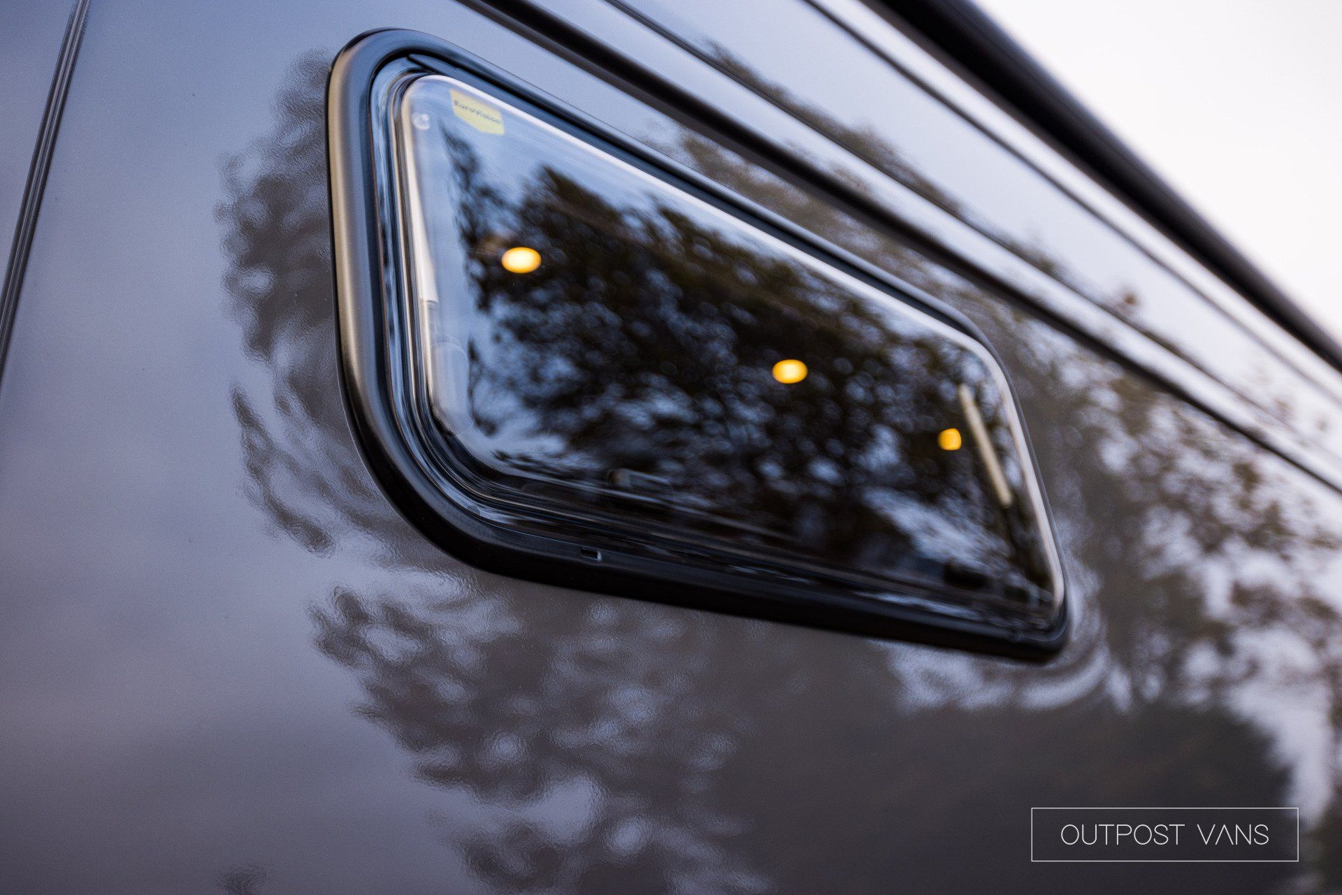 a close up of a window on the side of a vehicle .
